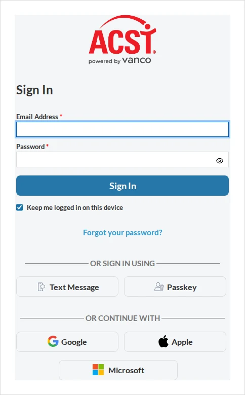 Realm by ACS Technologies sign-in screen with email, password, Text Message and Passkey options